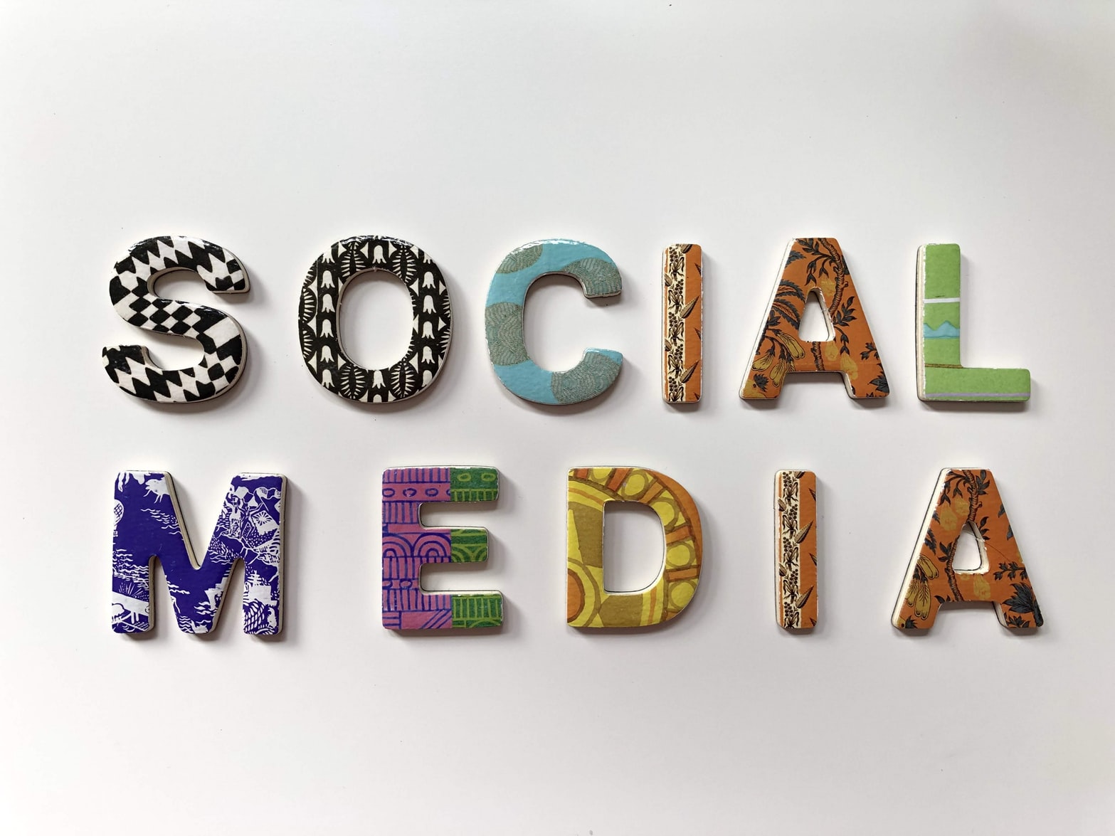 colourful ceramic letters forming the words: Social Media