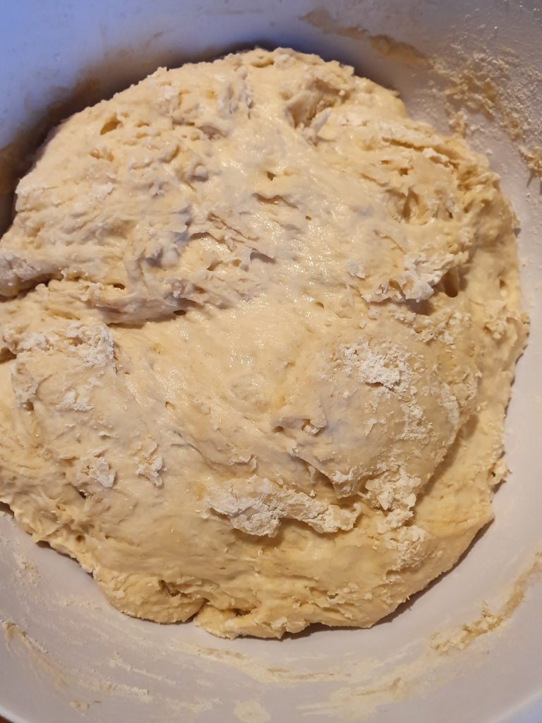 the dough in the bowl after 2 hours
