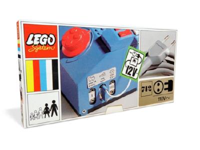 box of lego system, the controller is blue with a red button to adjust the speed, this is a French blue and the voltage is 12V