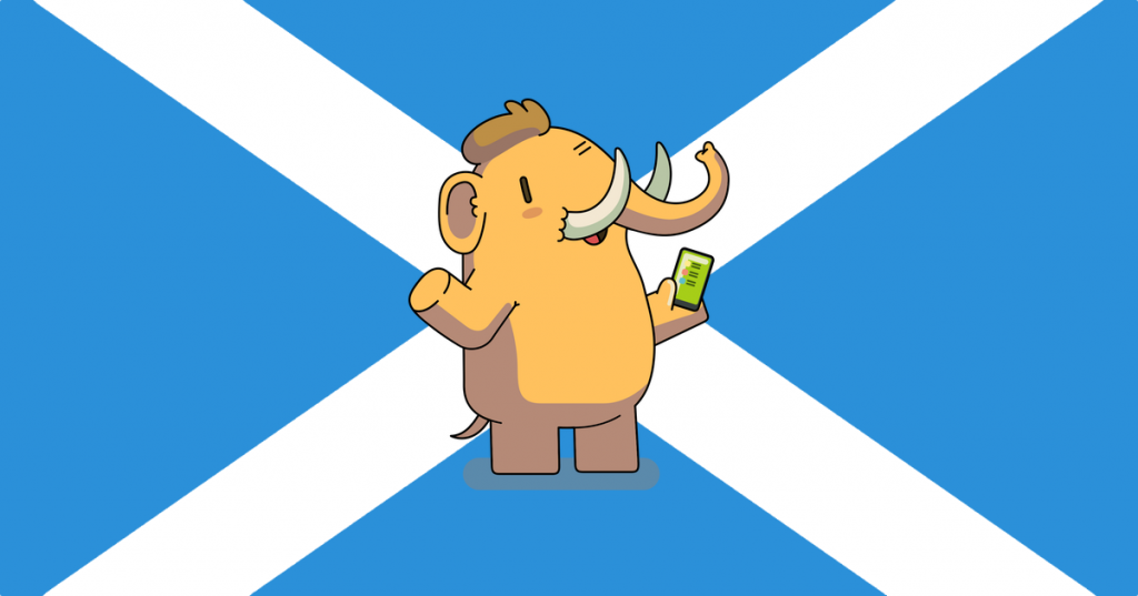 a saltire flag with the drawing of a mammoth using a phone in the middle