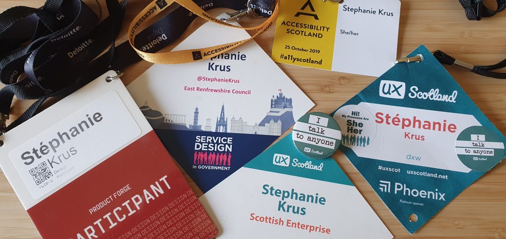 lots of conference passes with lanyard, there is one for UX Scotland this year and an old one, one from SDinGOV, and one from Accessibility Scotland 