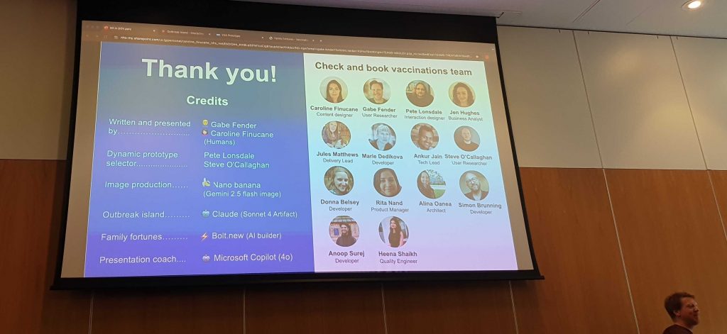 Gabe's head is at the bottom right, the rest is a big screen with the final thank you slide, which is 2 parts: on the right, you have round photos, names and job titles of the 'check and book vaccinations' team, and on the left, you have a big thank you and underneath they credit people who contributed to the presentation, like the family fortune game for example
